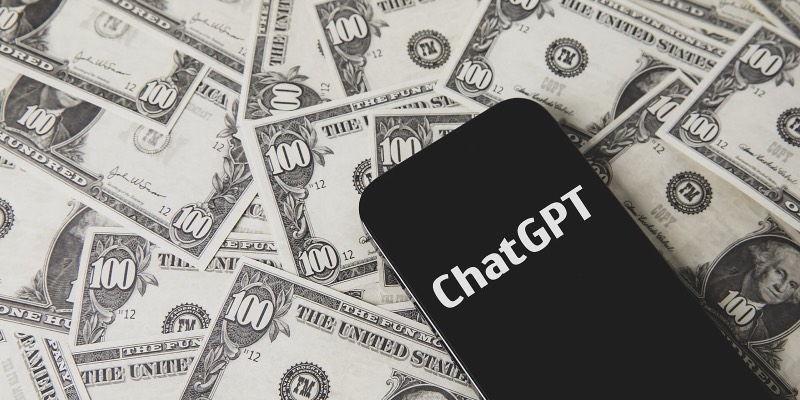 A smartphone showing the ChatGPT logo lying on US dollar bills