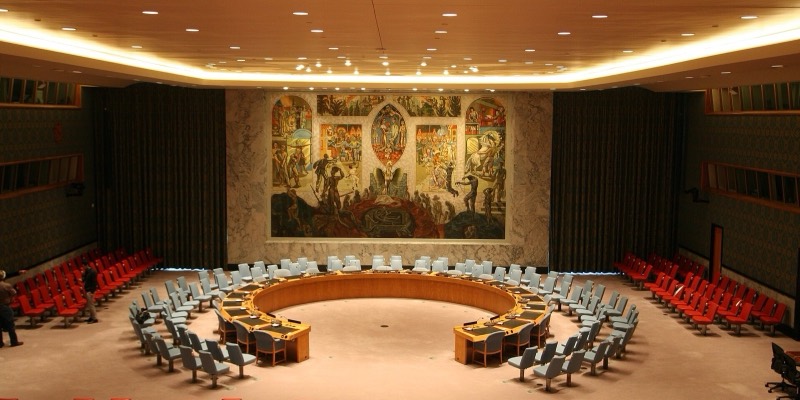The empty UN Security Council chamber in New York with its horseshoe table